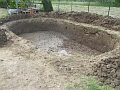 Base of crushed stone because of the ground water (usually not necessary!)