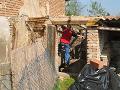 outside a small outhouse is torn down